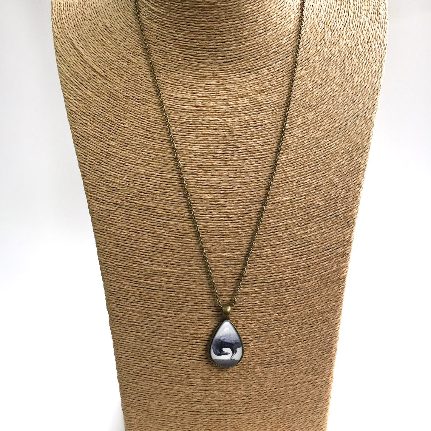 DOWNWARD CROW Teardrop-Shaped Glass Pendant