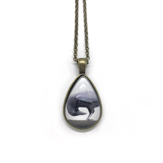 glass crow pendant - bronze - long with teardrop shape