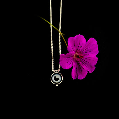 CROW LOOKS BACK - Miniature Pendant, Silver and Resin